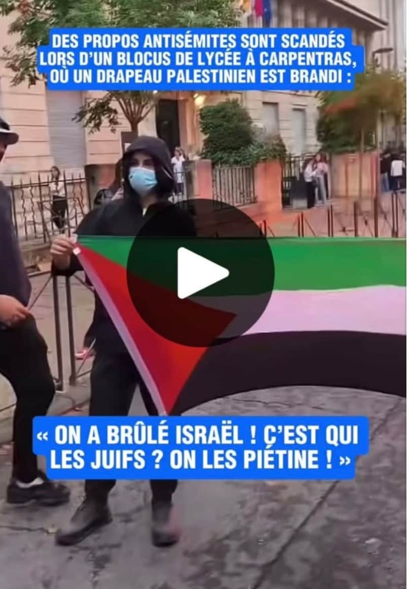 Capture d’une vidéo d’actualité montrant une personne masquée portant un drapeau palestinien
